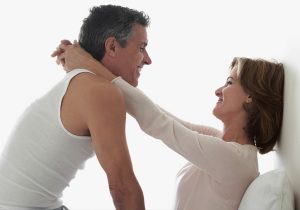Couple romancing in the bedroom